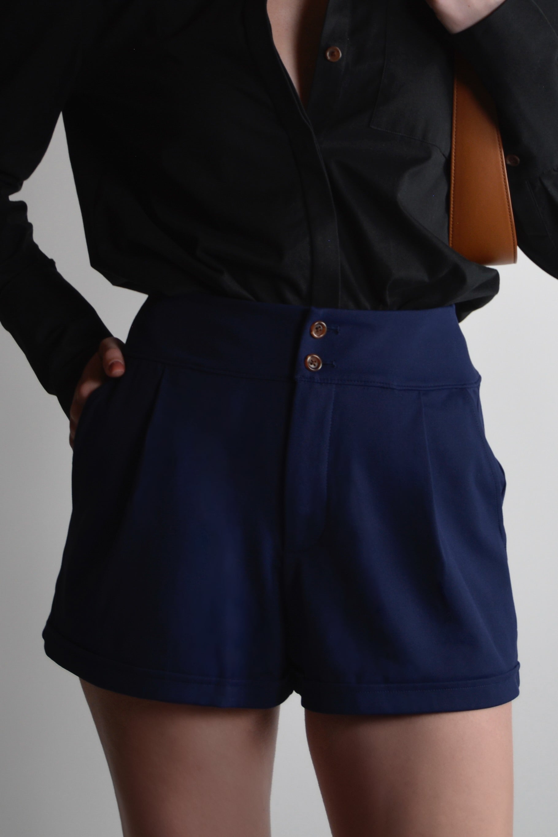 the garde women's golf and tennis shorts with tortoise buttons