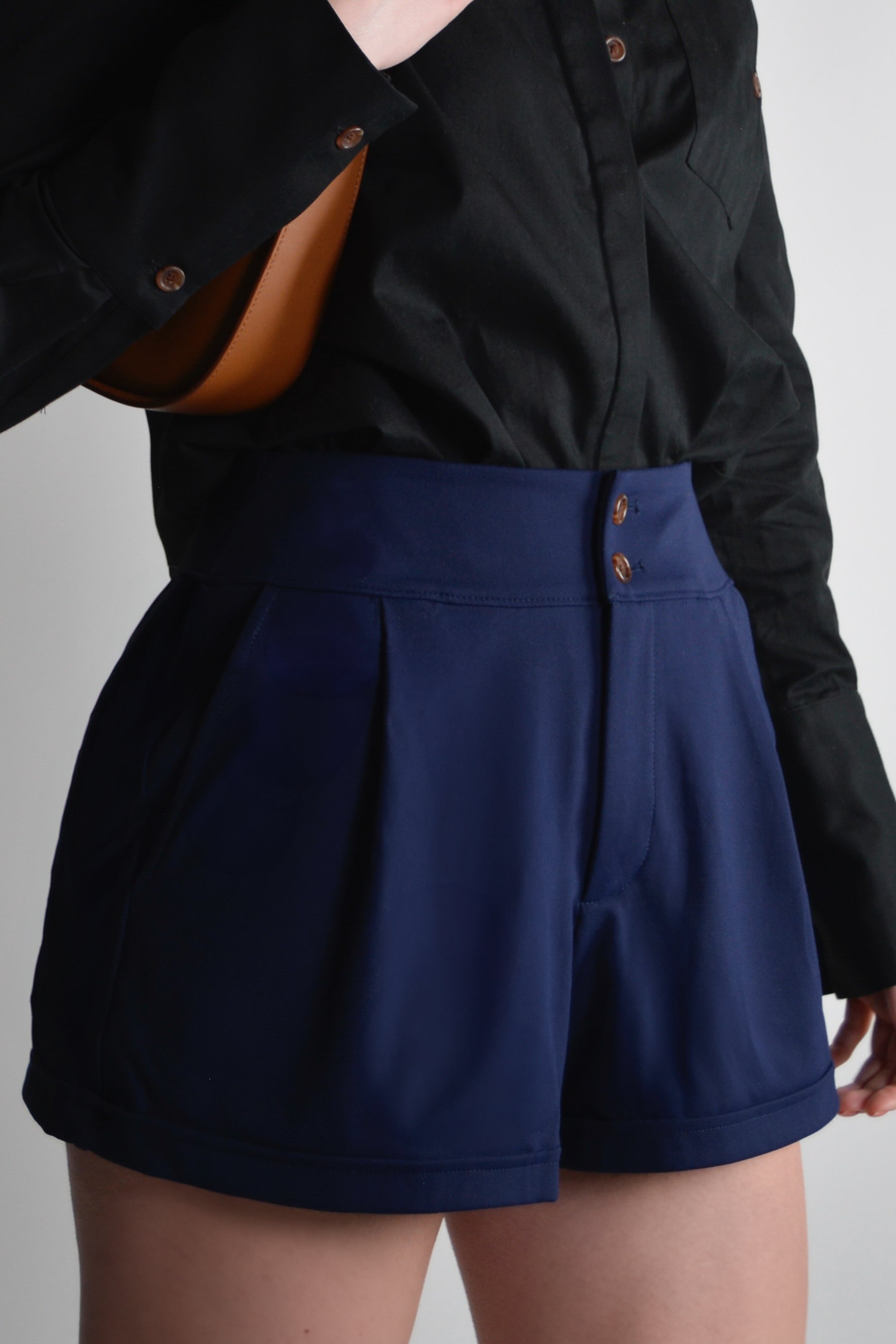 the garde women's golf and tennis shorts with tortoise buttons