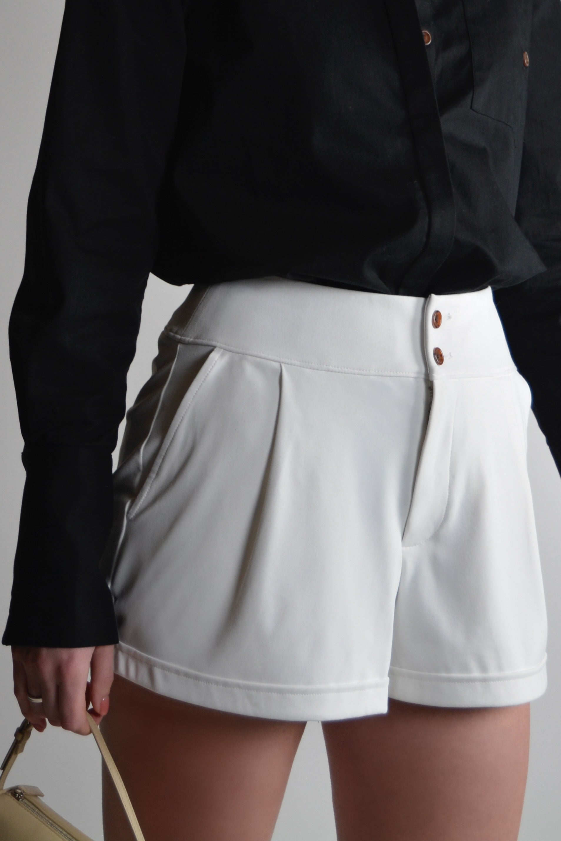 the garde women's golf and tennis shorts with tortoise buttons
