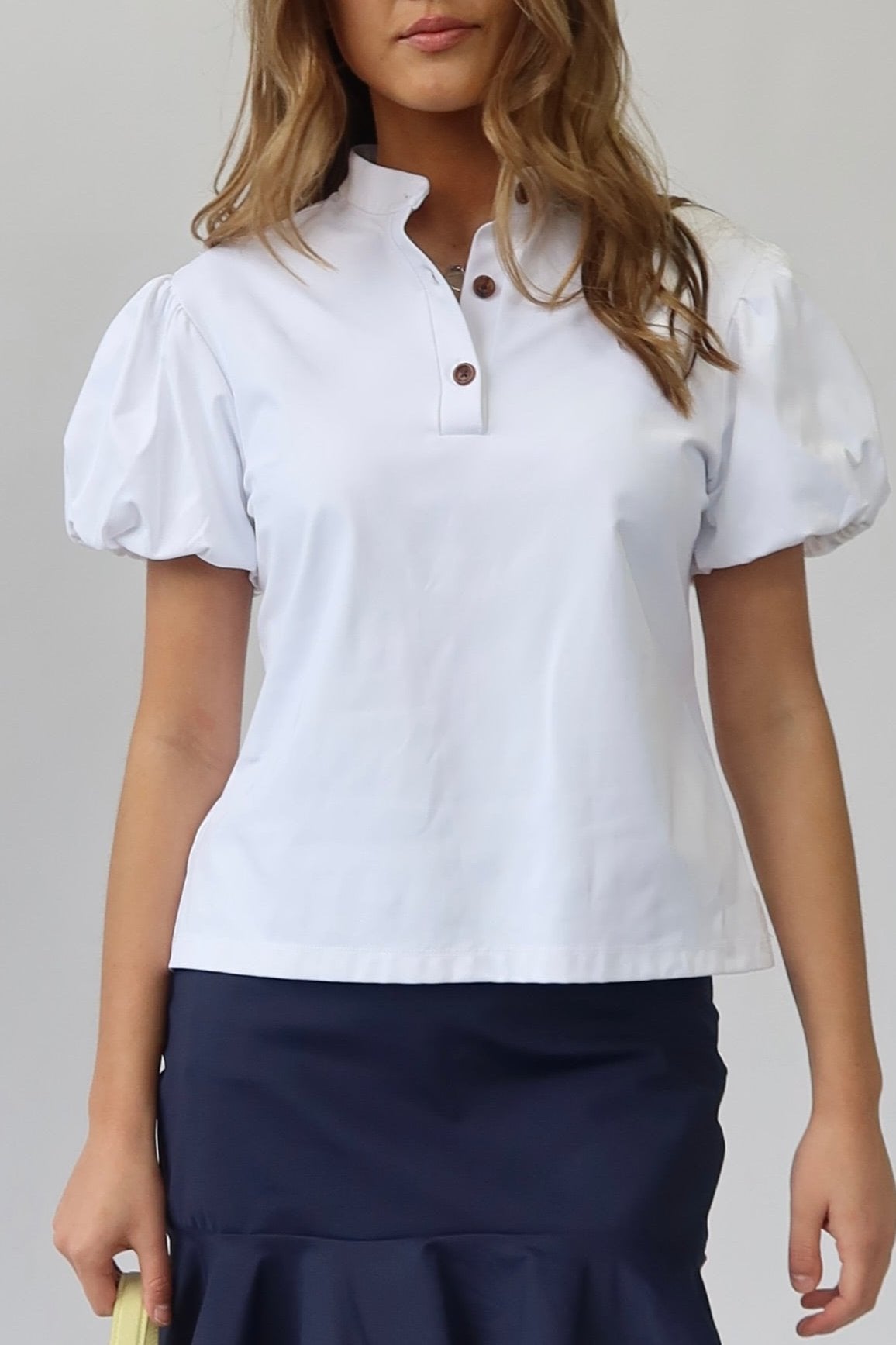 the garde women's golf puff sleeve polo in white